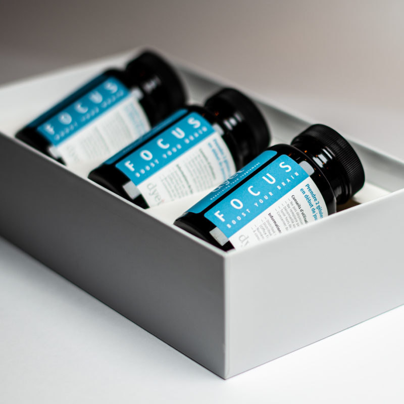 a group of bottles in a box